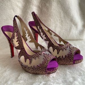 Christian Louboutin, size 39, fuchsia with small gold jewel embellishment